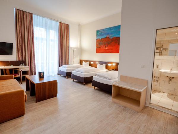 Hotel Tiergarten Berlin : photo 6 de la chambre chambre triple