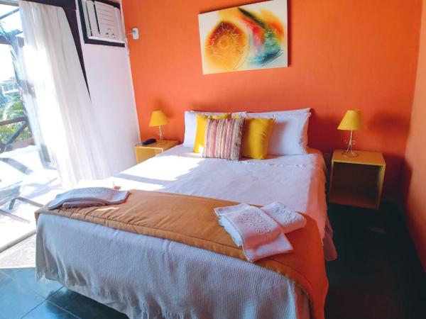 Pousada Vila do Sol : photo 6 de la chambre chambre triple - vue sur mer