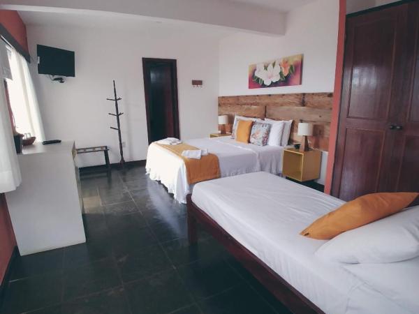 Pousada Vila do Sol : photo 9 de la chambre chambre triple - vue sur mer