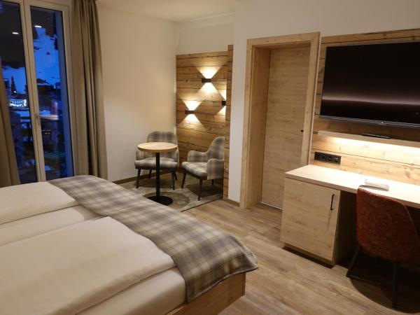 Hotel Schweizerhof : photo 9 de la chambre chambre double deluxe