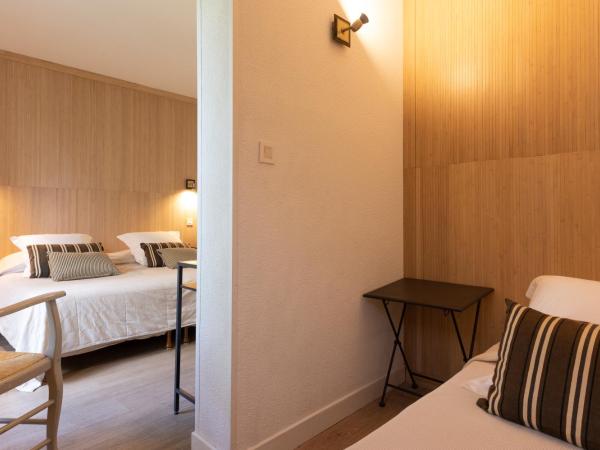 Hôtel l'Amandière : photo 6 de la chambre chambre triple avec climatisation