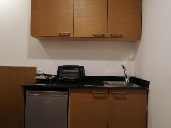 Casa City Break Appart hôtel : photo 5 de la chambre studio avec lits jumeaux