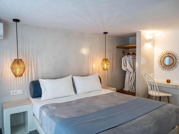 Galatia Villas : photo 3 de la chambre appartement supérieur en duplex avec jacuzzi extérieur