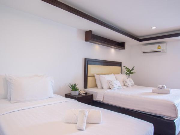 Initial Hua Hin - SHA Plus : photo 2 de la chambre chambre triple avec balcon