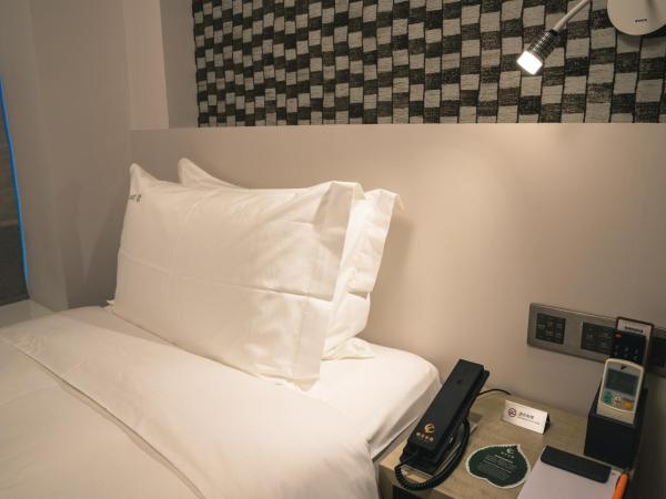 City Inn Macau : photo 1 de la chambre chambre simple supérieure