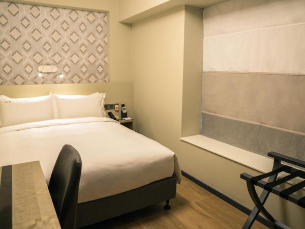 City Inn Macau : photo 8 de la chambre chambre lit queen-size deluxe