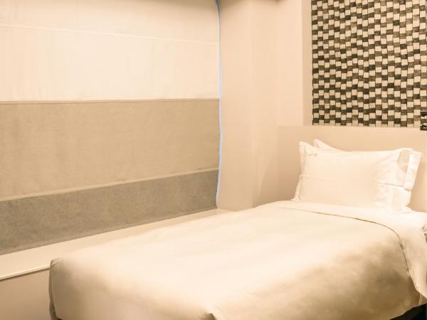 City Inn Macau : photo 4 de la chambre chambre simple supérieure