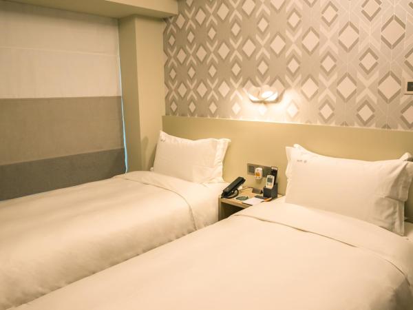 City Inn Macau : photo 4 de la chambre chambre familiale deluxe