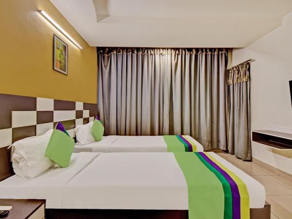 Treebo Raj Elegance Manyata Tech Park : photo 5 de la chambre [sanitized] standard double room