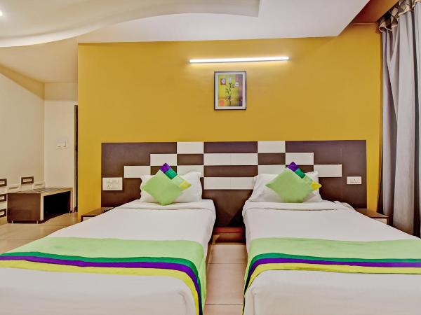 Treebo Raj Elegance Manyata Tech Park : photo 2 de la chambre [sanitized] standard double room