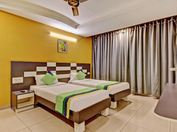 Treebo Raj Elegance Manyata Tech Park : photo 9 de la chambre [sanitized] standard double room