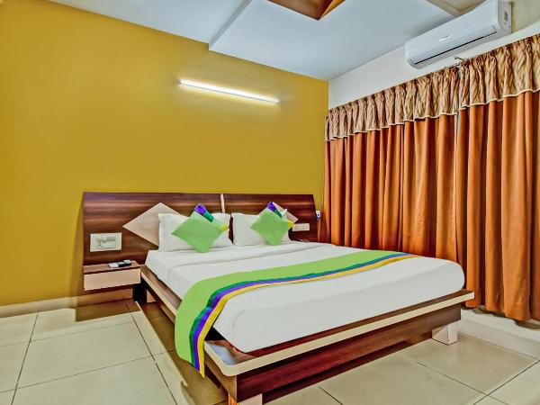 Treebo Raj Elegance Manyata Tech Park : photo 1 de la chambre [sanitized] standard double room
