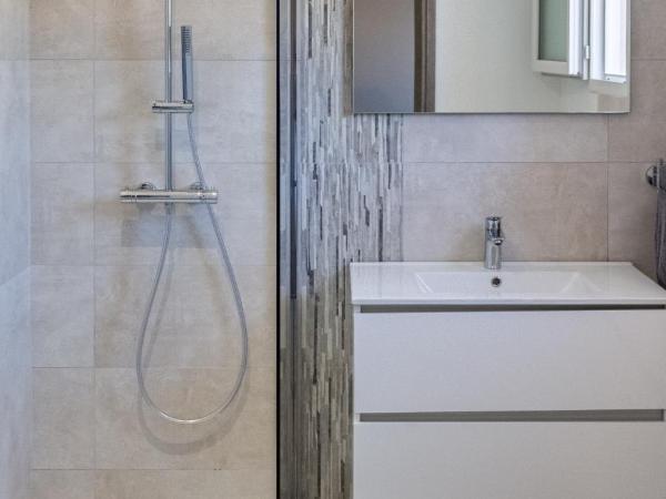 les terrasses d'arutoli : photo 1 de la chambre chambre double - vue sur jardin