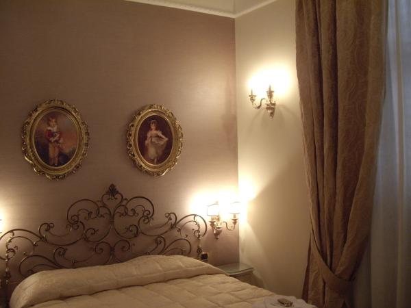 Executive L'Orangerie BB : photo 1 de la chambre chambre triple