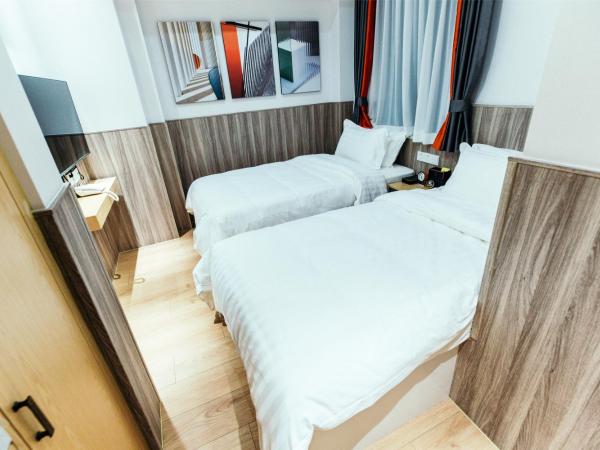 Shanghai Fish Inn People Square : photo 4 de la chambre chambre lits jumeaux deluxe