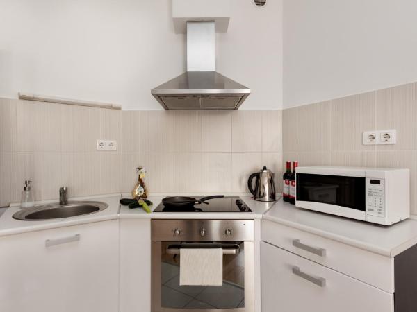 Corvin Plaza Apartments & Suites : photo 5 de la chambre appartement 2 chambres