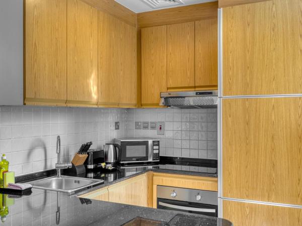 Grand Heights Hotel Apartments : photo 4 de la chambre premier one-bedroom