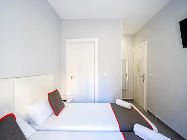 Hostal Jireh : photo 9 de la chambre chambre lits jumeaux