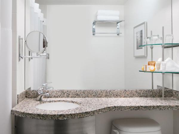 Club Quarters Hotel Downton, Houston : photo 1 de la chambre petite chambre lit queen-size