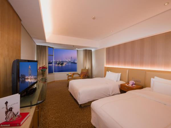 Shu Guang International Hotel : photo 3 de la chambre chambre lits jumeaux standard - vue sur ville