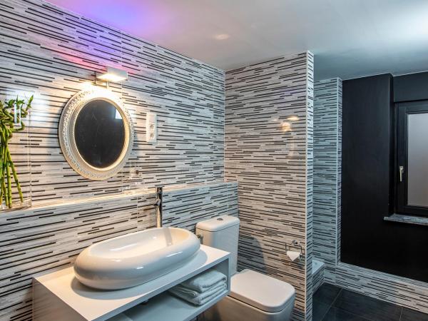 Maison Noppius : photo 3 de la chambre suite deluxe avec baignoire spa