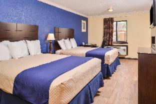 Americas Best Value Inn Medical Center Downtown : photo 2 de la chambre queen beds smoking