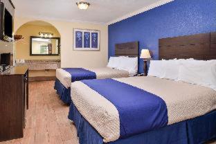 Americas Best Value Inn Medical Center Downtown : photo 4 de la chambre queen beds smoking
