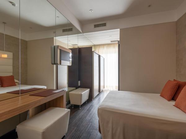 Bio Boutique Hotel XU' - Gruppo Ambienthotels : photo 1 de la chambre chambre triple deluxe