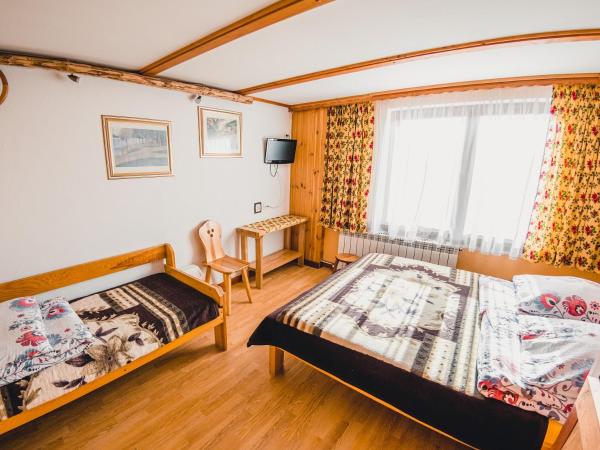Dom wypoczynkowy Stoch Mądry : photo 3 de la chambre chambre triple avec salle de bains