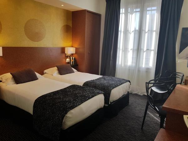 Hôtel Raymond 4 Toulouse : photo 3 de la chambre chambre lits jumeaux classique