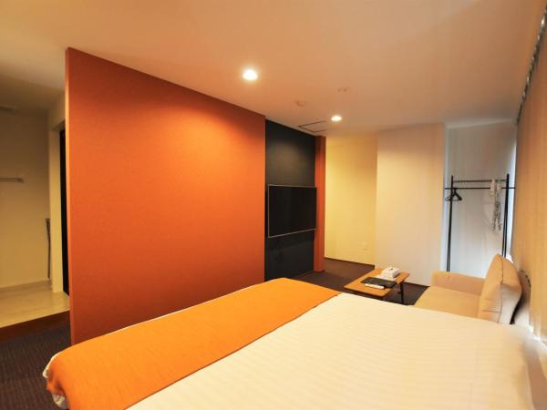 Randor Residence Tokyo Suites : photo 3 de la chambre suite lit queen-size avec baignoire spa
