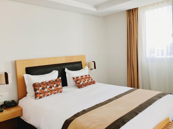 Le Pietri Urban Hotel : photo 6 de la chambre suite lit king-size avec balcon