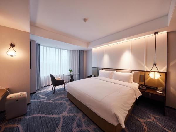 Shu Guang International Hotel : photo 4 de la chambre chambre double affaires