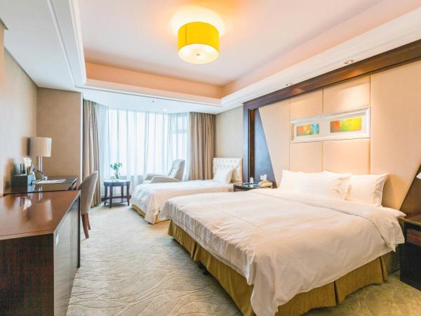 Shu Guang International Hotel : photo 3 de la chambre chambre lits jumeaux exécutive