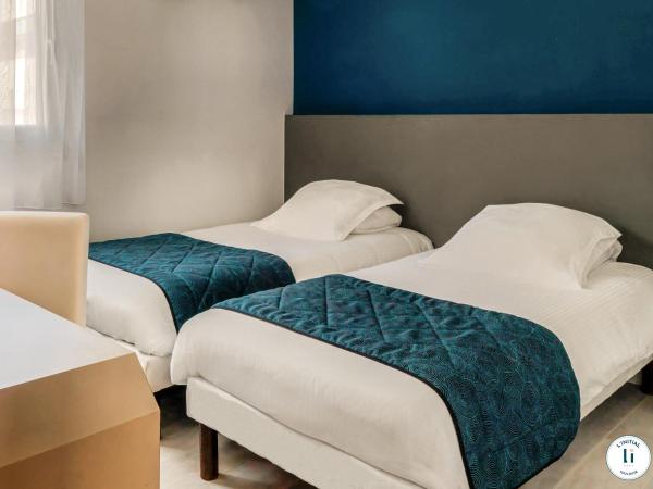 L'Initial : photo 1 de la chambre chambre lits jumeaux