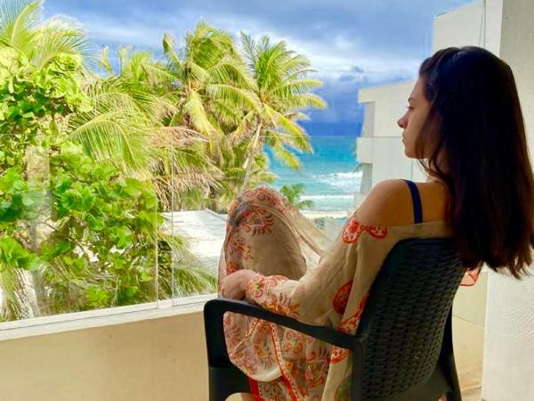 Hotel Playa La Media Luna : photo 1 de la chambre chambre lit king-size - vue partielle sur océan