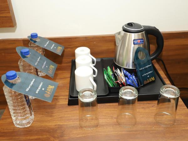 Suvin Residency with Rooftop Swimming Pool : photo 1 de la chambre chambre familiale