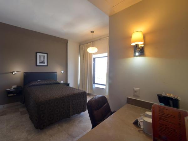 Hotel Mar y Tierra : photo 3 de la chambre chambre triple avec 3 lits doubles 