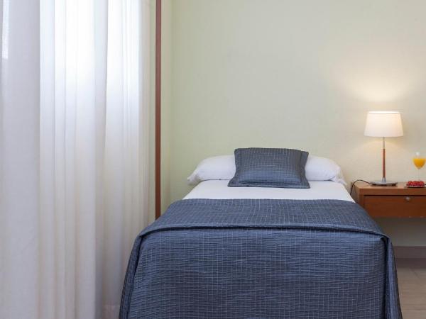 Porcel Torre Garden : photo 6 de la chambre chambre triple