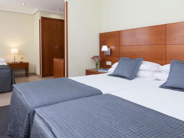 Porcel Torre Garden : photo 7 de la chambre chambre triple