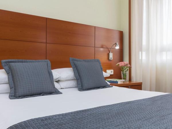 Porcel Torre Garden : photo 9 de la chambre chambre triple