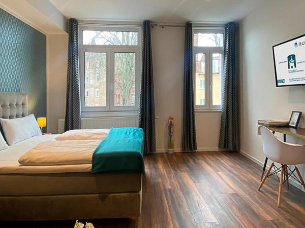 Nurban Apartments Oldtown : photo 8 de la chambre comfort suite apartment with sofa bed