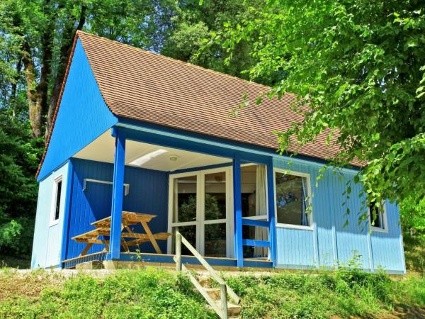 Les Chalets du Périgord : photo 6 de la chambre chambre familiale