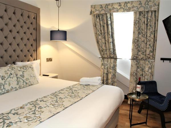 The Lane - Boutique Residence : photo 1 de la chambre chambre lit king-size deluxe