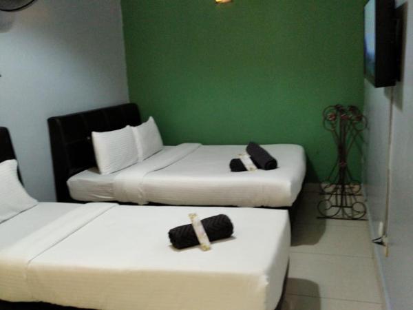 Ghazrins Hotel Dataran Larkin : photo 2 de la chambre chambre triple standard