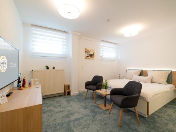 Hotel zum Kuhhirten : photo 1 de la chambre doppelzimmer economy im souterrain