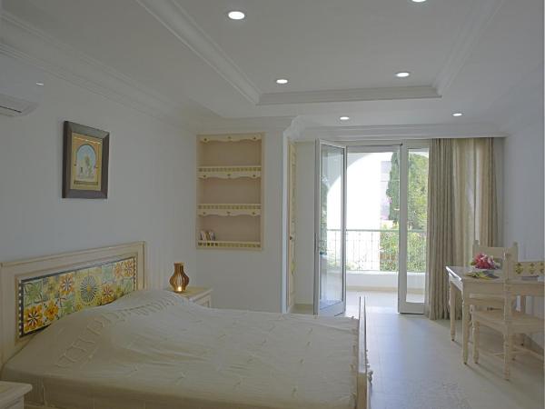Dar El Yasmine Tunis : photo 7 de la chambre chambre double - vue sur jardin