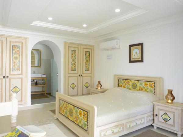 Dar El Yasmine Tunis : photo 5 de la chambre chambre double - vue sur jardin