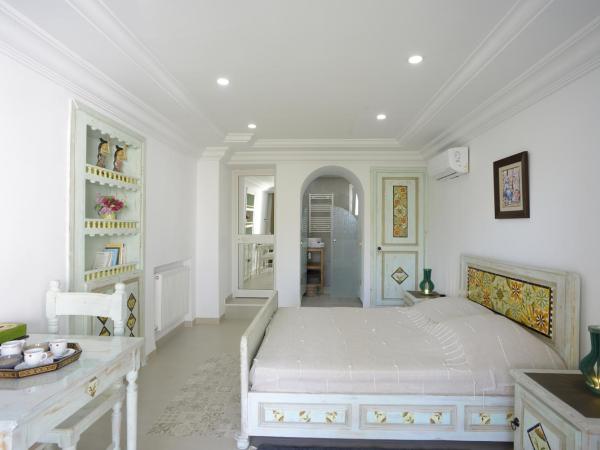 Dar El Yasmine Tunis : photo 6 de la chambre chambre double - vue sur jardin