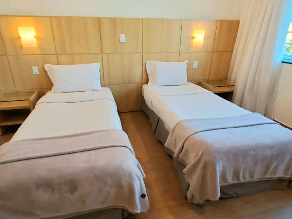 Atlantico Sul Hotel : photo 2 de la chambre chambre lits jumeaux - vue sur ville